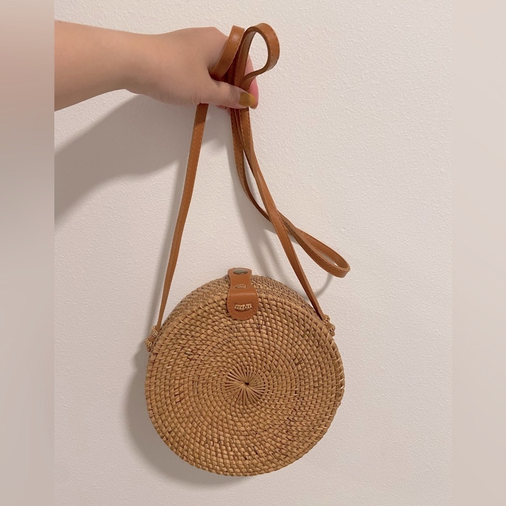 Circular Woven Straw Bag with Ethnic-Style Lining and Leather Accents